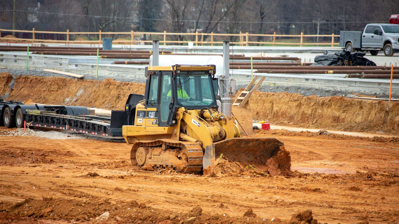bulldozer moving dirt at a construction site