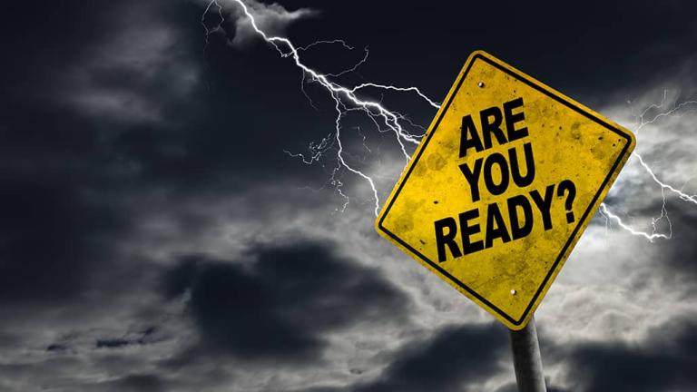 Sign that reads "are you ready" with a storm behind it