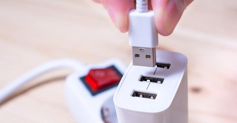 USB plug going into charger